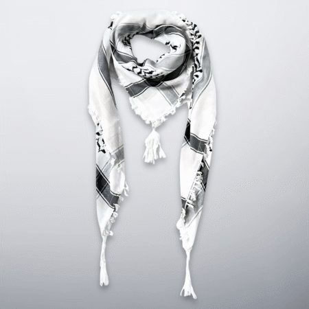 Black and white Palestinian keffiyeh with tassels, folded in a triangle.