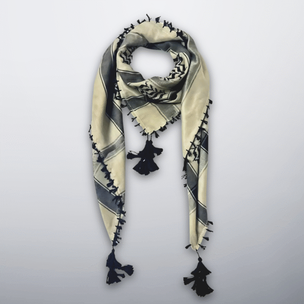 Beige and black Palestinian keffiyeh with tassels, desert inspired tones.