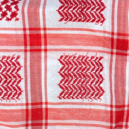 A closeup product image for the classic red and white keffiyeh