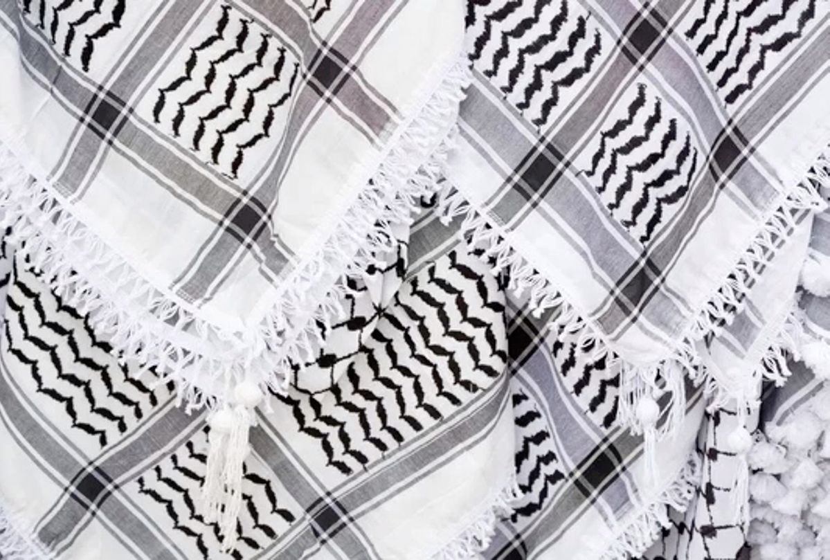 closeup of multiple black and white keffiyehs