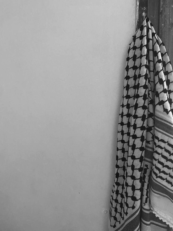 Keffiyeh hanging from a wall closeup.