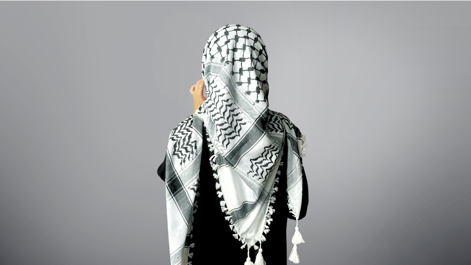 keffiyeh hijab in black and white draped from the back