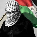 Palestine scarf wrapped around the face, flag waving in the background