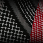 Authentic keffiyeh Palestinian scarf in traditional black and red patterns