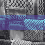 Display of black and white keffiyeh patterns stacked in a shop