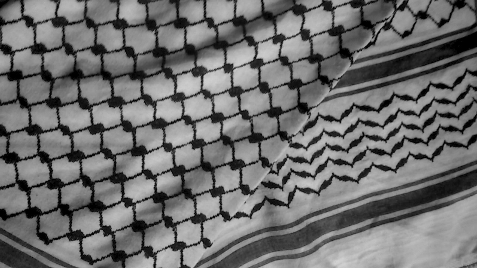 Display of original keffiyeh scarf in black and white